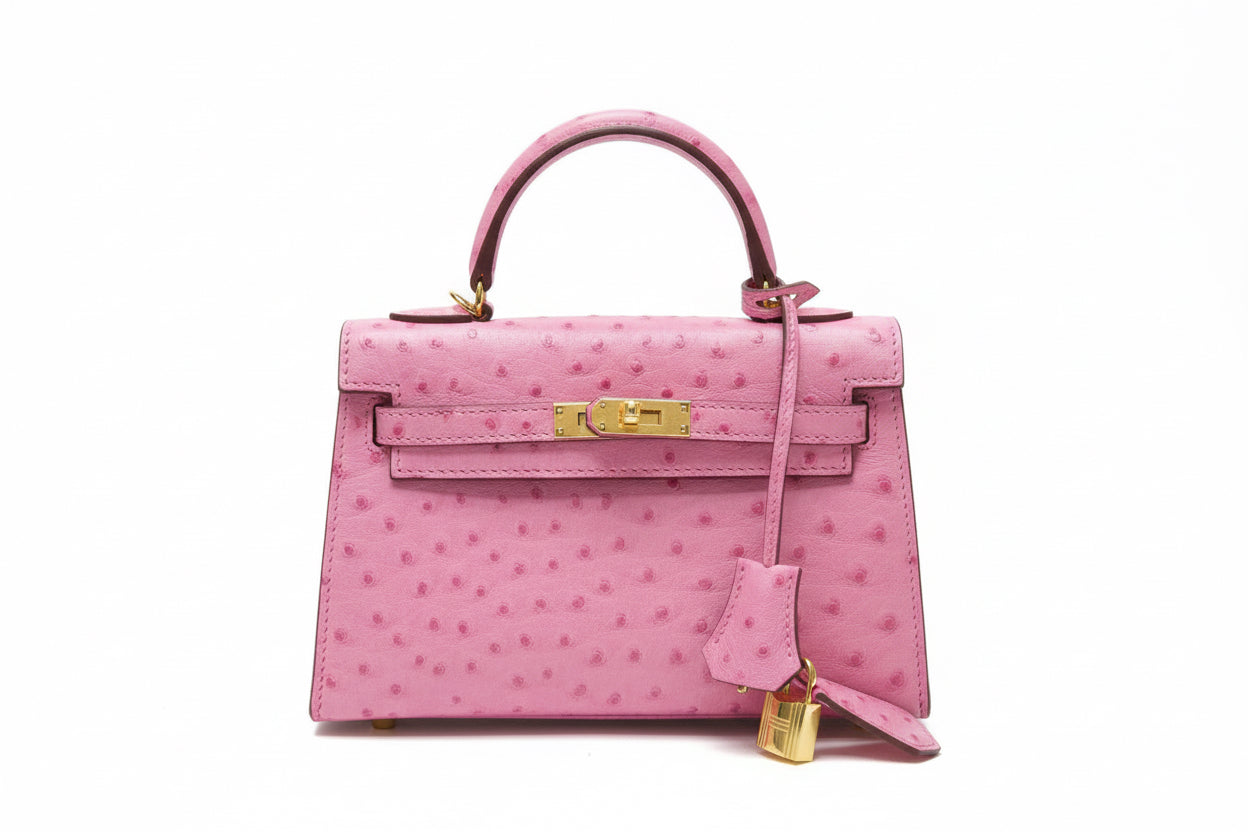 Ostrich embossed top handle handbag with strap
