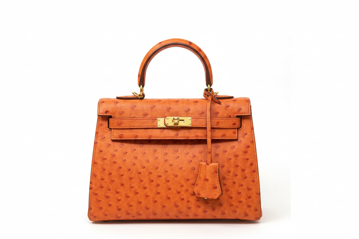 Ostrich embossed top handle handbag with strap